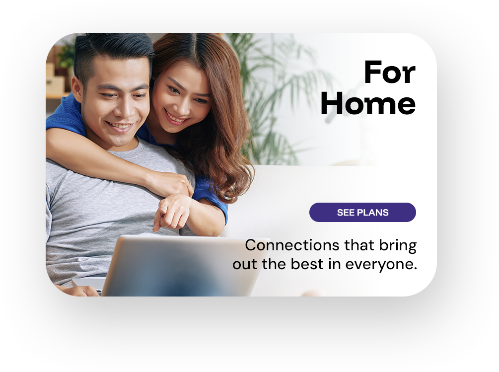 A smiling couple sitting on a couch, looking at a laptop together. The woman is hugging the man from behind. To the right, there is text that says "For Home" and "Connections that bring out the best in everyone." Below the text is a purple button labeled "See Plans."